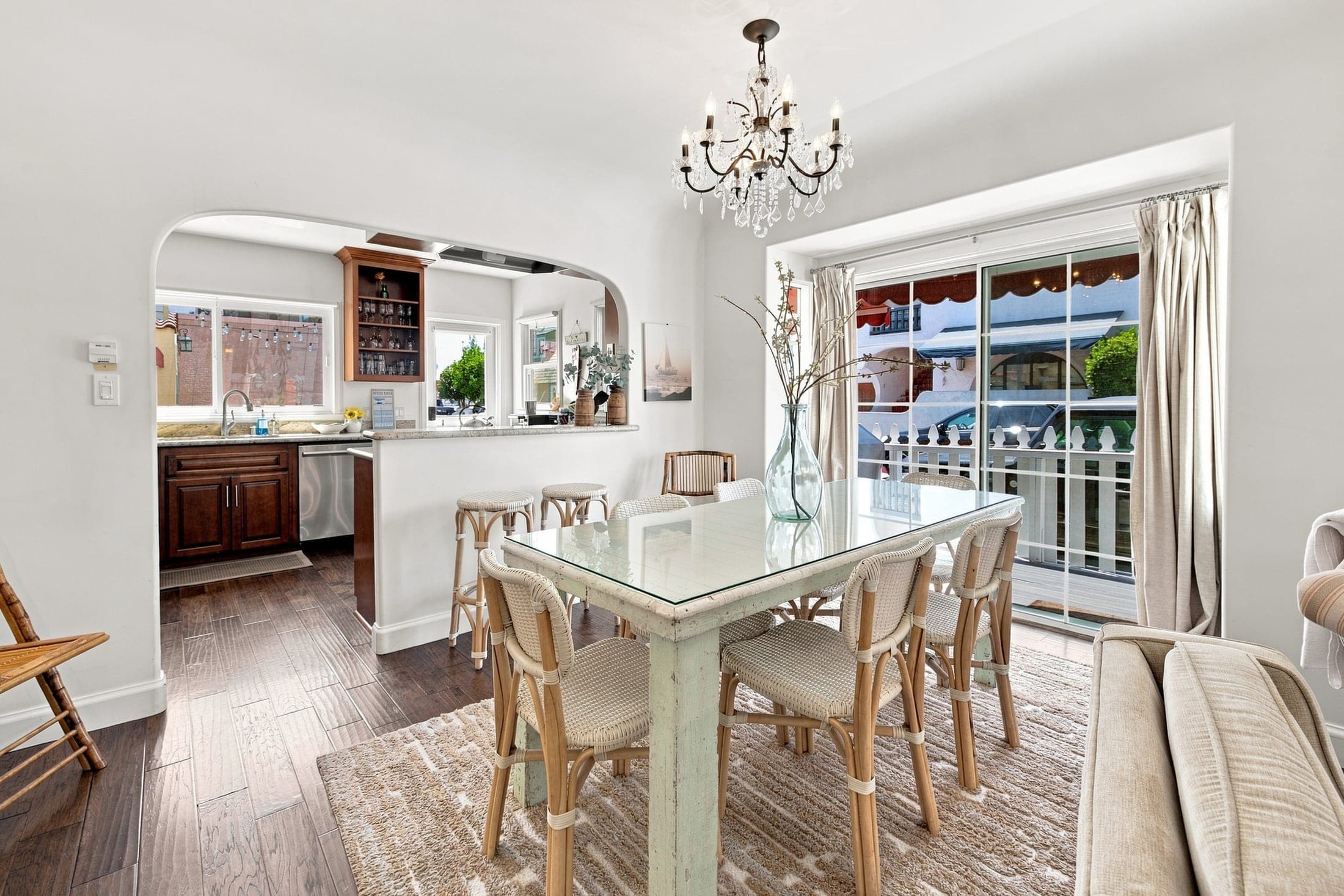 Dining area with a table and patio doors